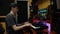 Digital audio workstation. Home recording studio. Songwriter musician engineer playing midi keyboard piano in home recording studi