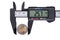 The digital caliper with coin of two euros. Objects isolated on