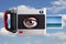 Digital camera with blue eye on sky background. 3d illustration.