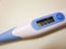 Digital clinical thermometer showing body temperature