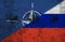 Digital composite image of flag of nato and russia painted on damaged wall, copy space