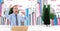 Digital composite image of successful businessman with laptop in city