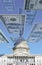 Digital composite: U.S. Capitol with floating one hundred dollar bills