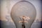 Digital composition, vintage bulb with power factor background