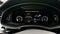 Digital dashboard of a car with speedometer, tachometer, indicators of driving modes and electronic assistants. I