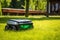 digital display on robotic mower on green grass