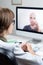 Digital health concept: practicing physician having online appointment with a patient. Medical doctor consulting a person by mean