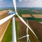 A digital illustration of windmills in a field.