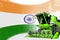 Digital industrial 3D illustration of green advanced wheat combine harvester on India flag - agriculture equipment innovation