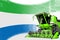 Digital industrial 3D illustration of green advanced wheat combine harvester on Sierra Leone flag - agriculture equipment