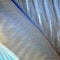 A digital interpretation of a feather, with textured and patterned shapes resembling the delicate feathers of a bird2, Generativ