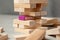 Digital marketing strategy is the basis of business. Tower of wooden blocks and in the foundation of one purple block MARKETING