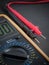 Digital Multimeter on black background close up