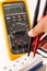 Digital multimeter measuring voltage