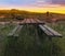 Digital Oil Painting, Beautiful twilight picturesque farmland view of Middle Valley, Canterbury, New Zealand. Wooden bench and tab