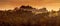 Digital painting of hilltop village at sunset with beautiful light. Vaucluse, south of France