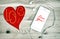 Digital phone with red heart. Love and Valentines Day