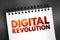 Digital Revolution - shift from mechanical and analogue electronic technology to digital electronics, text on notepad, concept