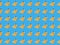 Digital seamless pattern with bananas  on light blue background