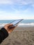 Digital tablet beach