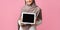 Digital tablet with black screen in hands of girl in hijab