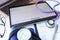 Digital tablet with electrocardiogram lying on doctors desk closeup