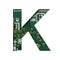 Digital technology font. The letter K cut out of white on the printed digital circuit board with microprocessors and