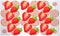 Digital textile design of strawberry fruit on Christmas elements background