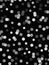 Digital white polka dots on black
