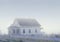 Digitally altered view of a house shrouded in snow and fog in Mendocino, California