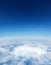 Digitally generated graphic Blue sky over white clouds