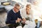 Digitizing the budgeting process. a mature couple using a digital tablet while going through paperwork at home.