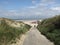 A dike crossing to the sea at the dutch coast in cadzand, holland