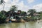 Dilapidated abandon fisherman boat stranded near the riverside a
