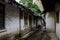 Dilapidated aged dwelling houses after summer rain