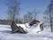 Dilapidated alpine hut in winter