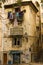 Dilapidated building. Picturesque corner in Alfama. Lisbon. Portugal