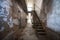 Dilapidated hallway and stairs at Eastern State Penitentiary