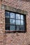 Dilapidated metal window frame
