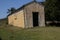 Dilapidated Peeling Unused Corrugated Iron Railway Shed