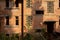 Dilapidated red-brick dwelling building in abandoned factory of 1970s