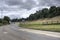 Dilapidated Section of Brooklands Racetrack Adjacent to Modern Road