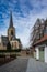 Dilbeek, Flemish Brabant, Belgium, Rural road towards the village and Saint Remigius church