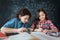 Diligent little pupils enjoying class at school