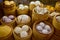 Dim sum, speciality of Cantonese cuisine, prepared and served in the small steamers