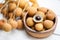 Dimocarpus longan exotic fruits on wooden bowl background - Fresh Longan  tropical fruit in Thailand