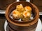 Dimsum Hagao in chinese bamboo basket traditional food in a restaurant.