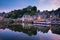 Dinan and Medieaval Stone Houses Reflecting in Rance River at Dusk in Summer in Bretagne, Cotes d`Armor, France