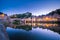 Dinan and Medieaval Stone Houses Reflecting in Rance River at Dusk in Summer in Bretagne, Cotes d`Armor, France