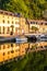 Dinan Stone Houses Reflecting in Rance River at Sunrise in Bretagne, Cotes d`Armor, France